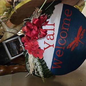 Red and Blue Welcome Sign